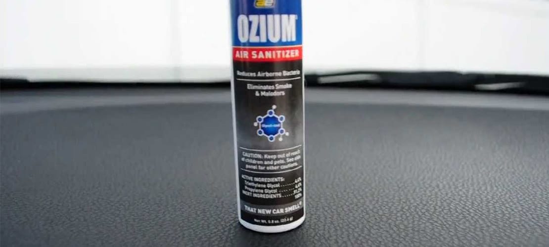 Ozium deodorizing spray on dash for car