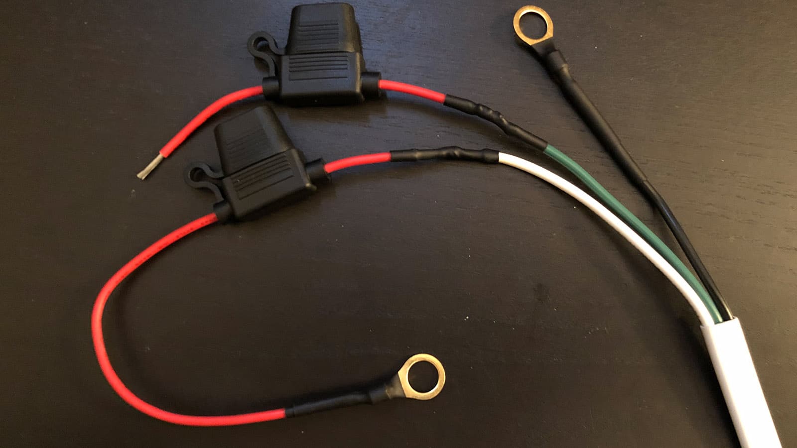 Positive and negative wires with battery terminal connections soldered