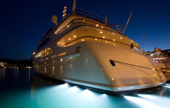 Yacht with best underwater led lights in harbor