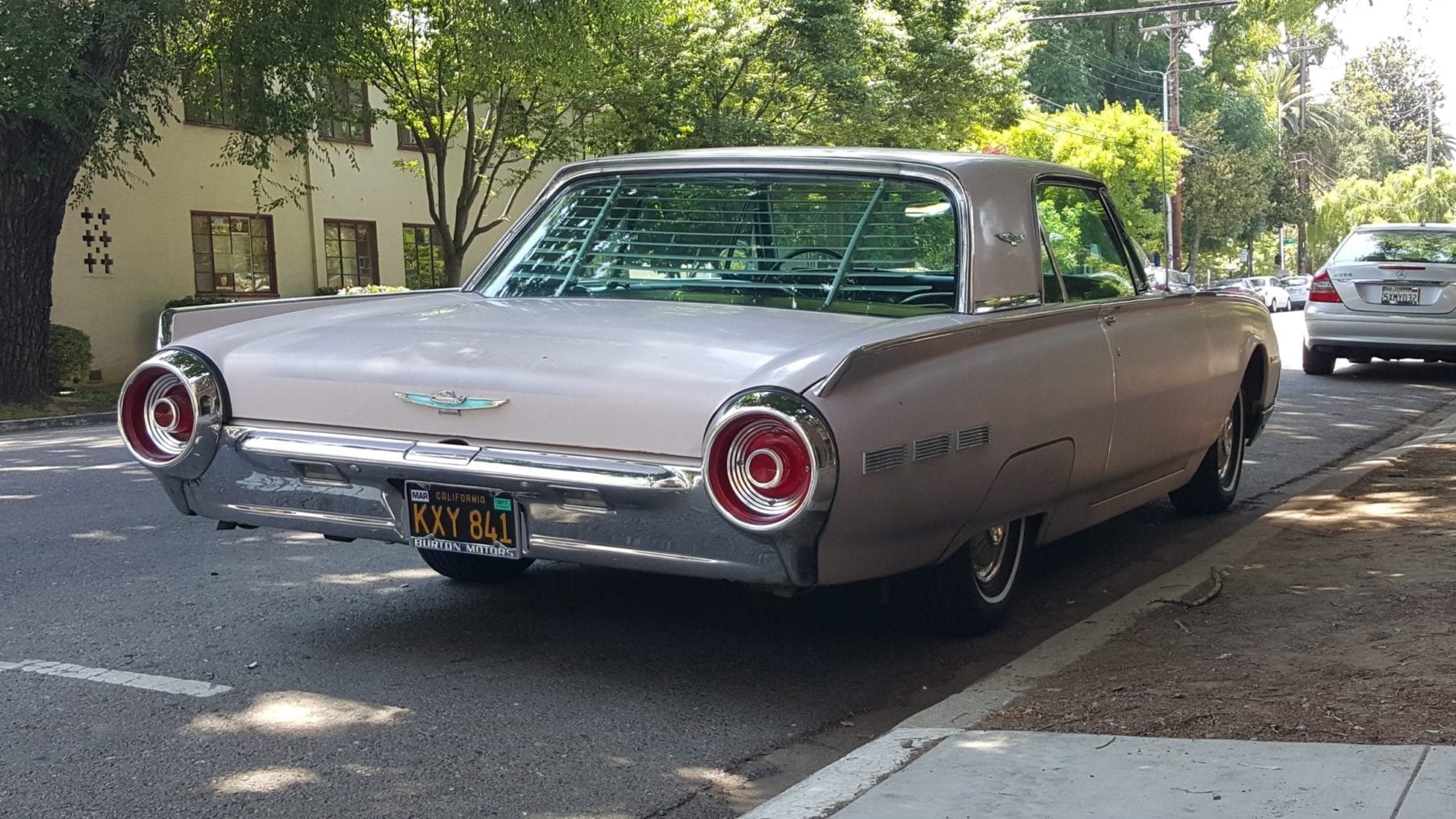 1962 TBird Rear with tail lights and trunk parked