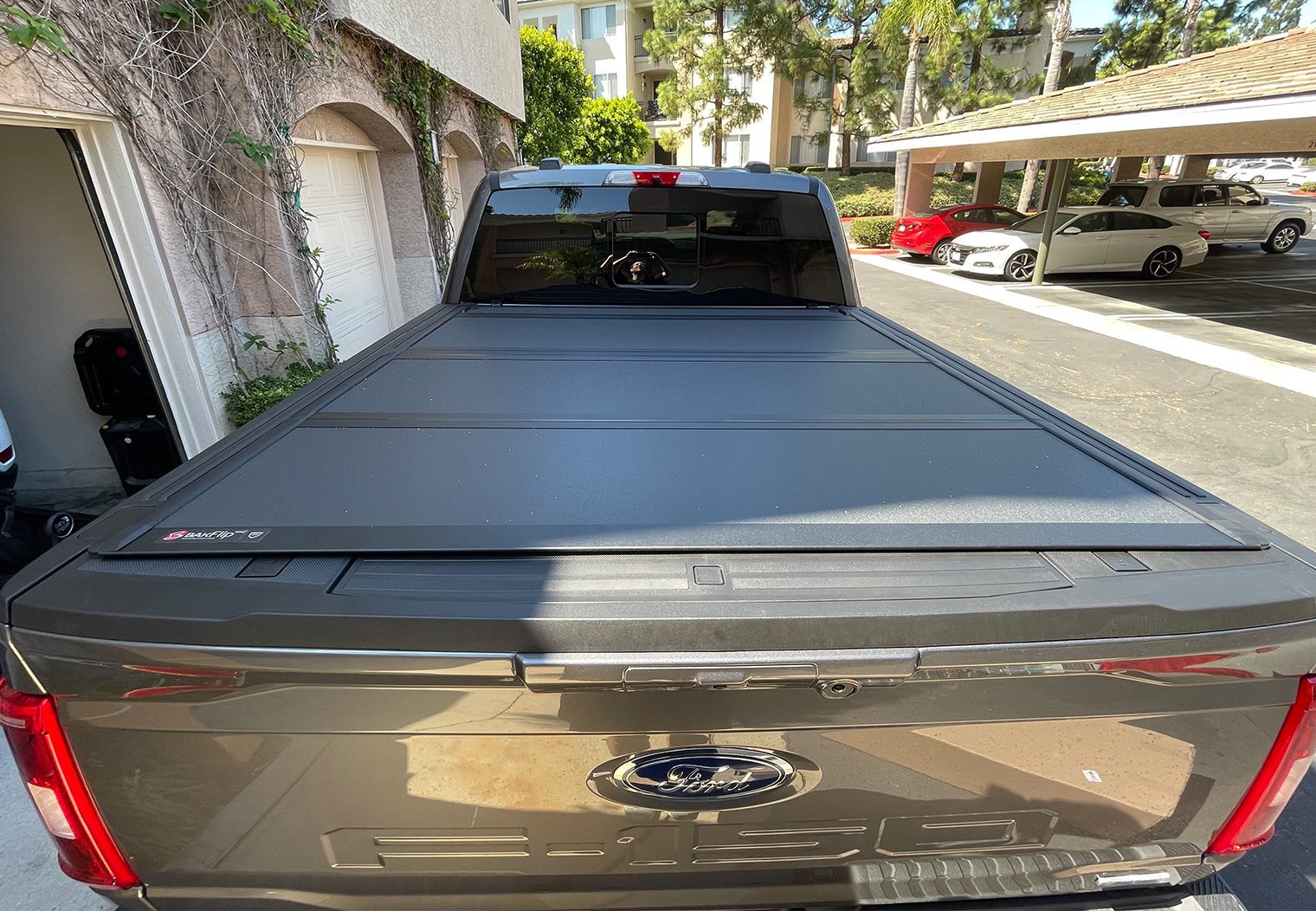 View of the BAKFlip MX4 installed on a 2021 Ford F150 from the tailgate view