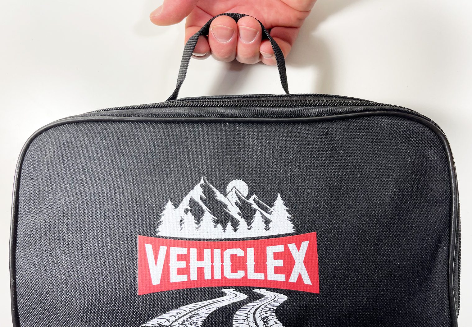 VehicleX Ratchet Tie-Down carrying bag handle