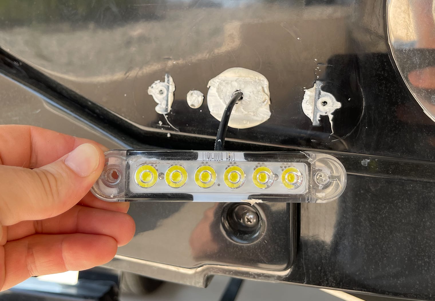 Removing the port OEM underwater LED on a Nautique G23