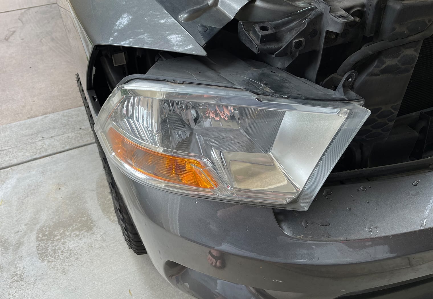 Image to show what it looks like as the ram 1500 headlight is removed from the truck
