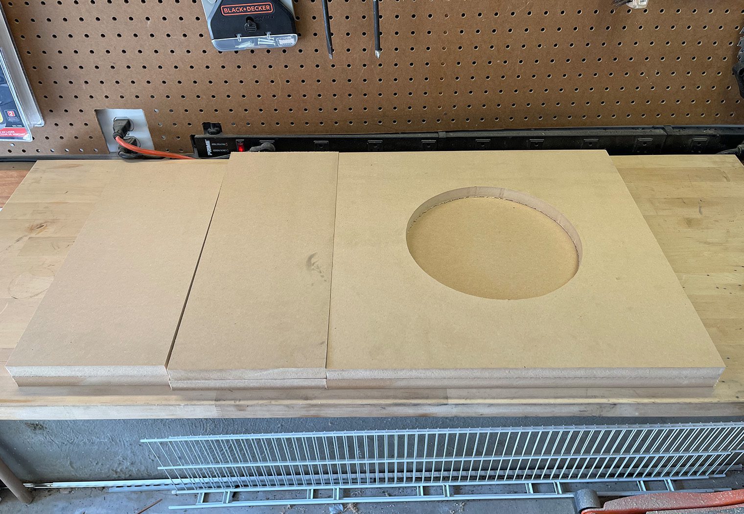 Picture of the cut MDF to assemble custom subwoofer enclosure for 2018 VW GTI MK7.5
