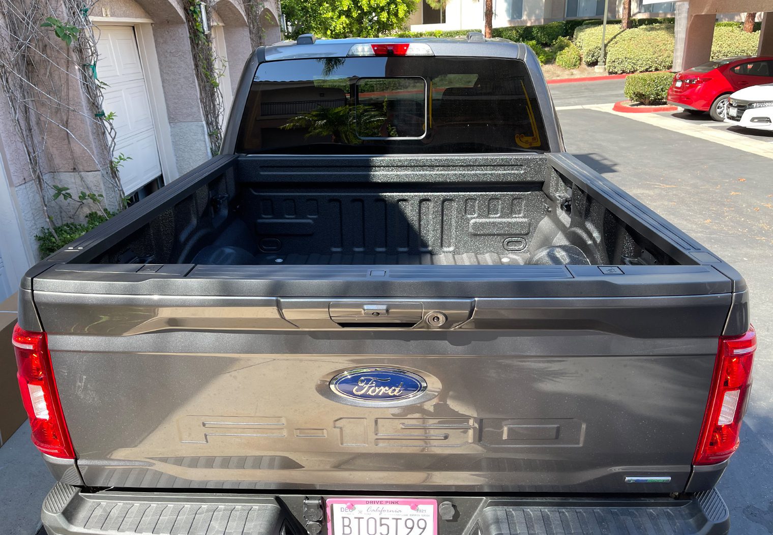Picture of the bed of a 2021 Ford F150 with spray in bedliner