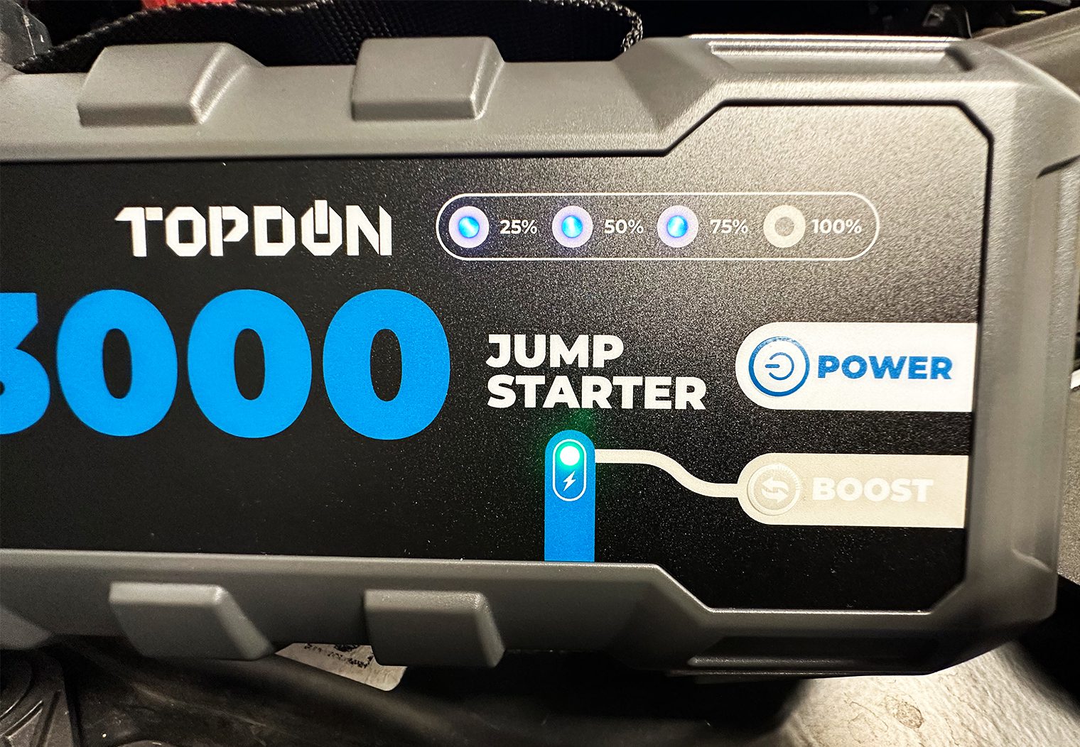 Jump starter connected to battery