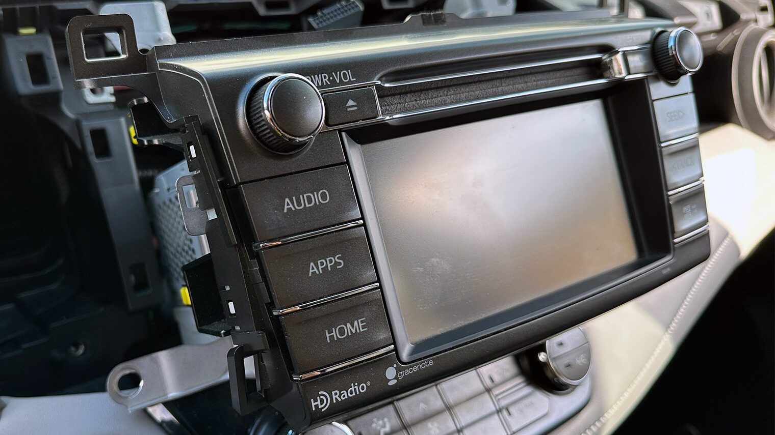 Removing OEM head unit on a Toyota RAV4 to install an aftermarket Sony