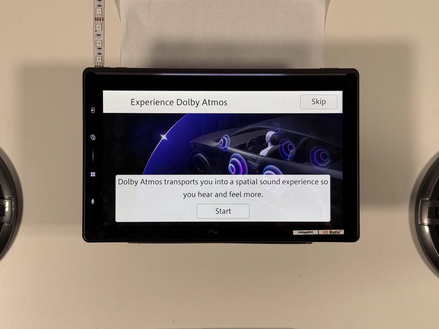 Pioneer DMH-WT8000NEX Experience Dolby Atmos screen with Start and Skip buttons
