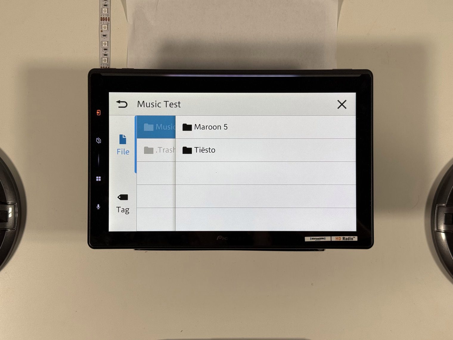 Pioneer DMH-WT8000NEX USB music browser in a Music Test folder, with File and Tag tabs and two artist folders