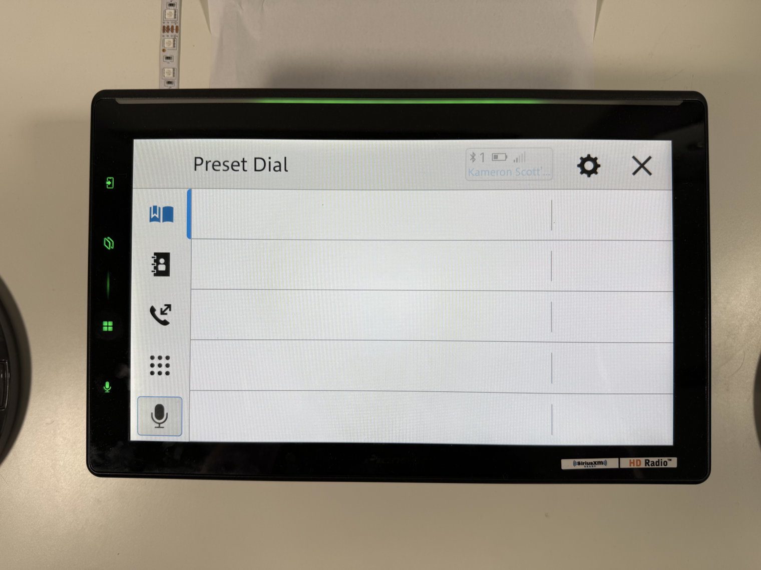 Pioneer DMH-WT8000NEX Bluetooth phone screen on the Preset Dial tab, with the preset rows empty