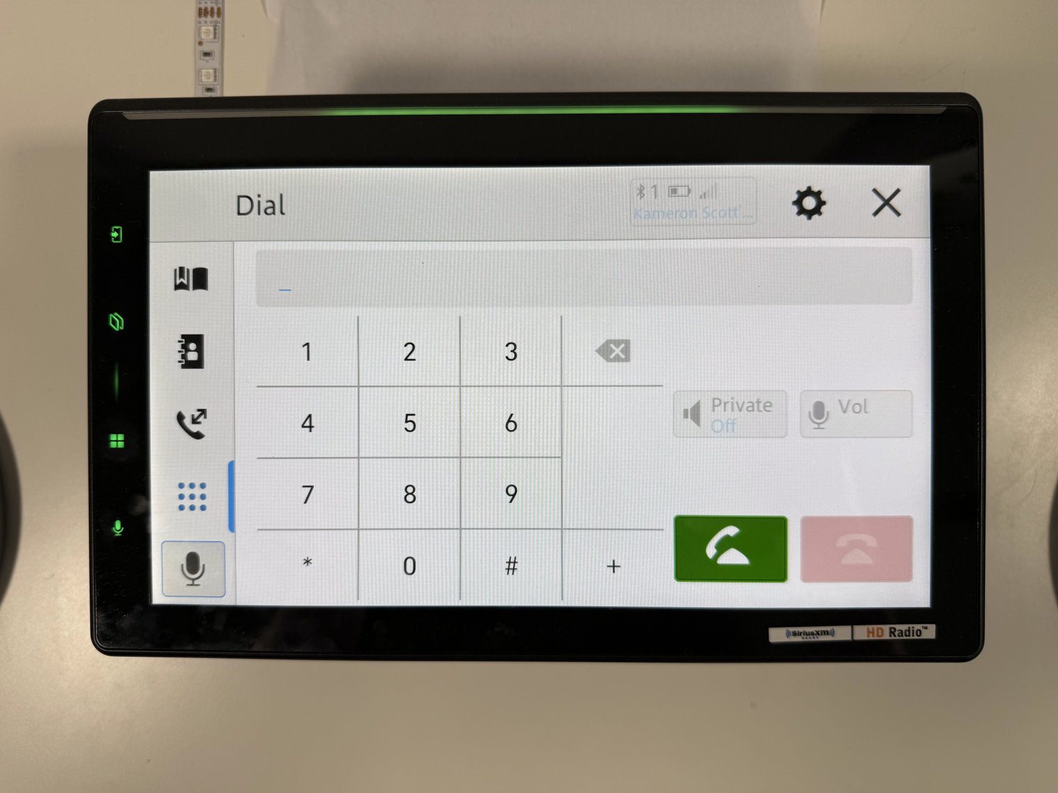 Pioneer DMH-WT8000NEX Bluetooth phone keypad with Private and Vol buttons above the green call and red end keys