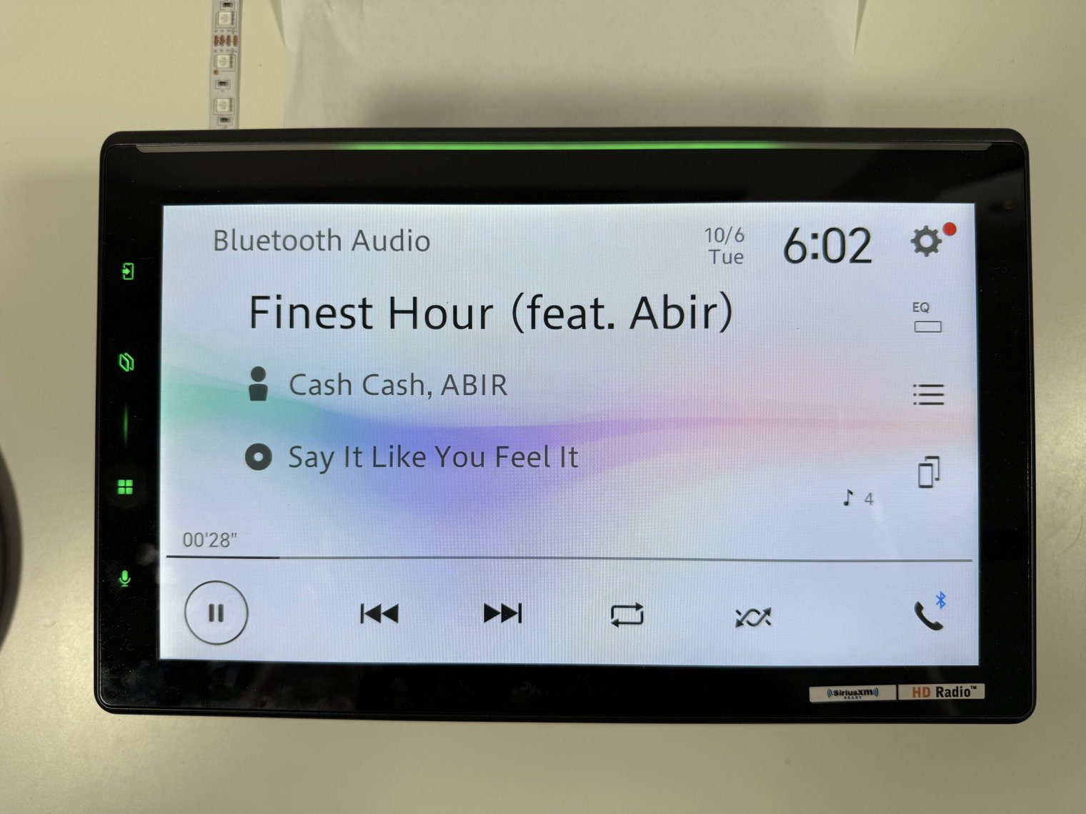 Pioneer DMH-WT8000NEX Bluetooth Audio now-playing screen showing track, artist, album and playback controls