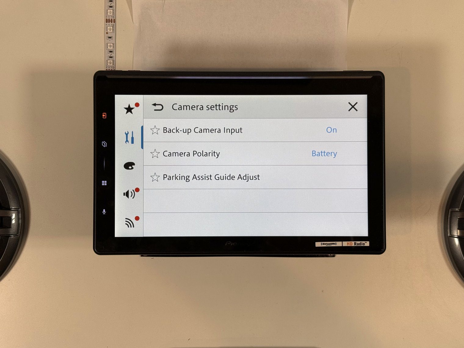 Pioneer DMH-WT8000NEX Camera settings menu showing Back-up Camera Input, Camera Polarity and Parking Assist Guide Adjust