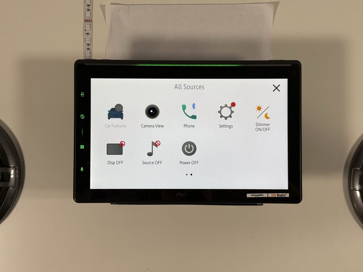 Pioneer DMH-WT8000NEX All Sources page two with Camera View, Phone, Settings, Dimmer and power shortcuts