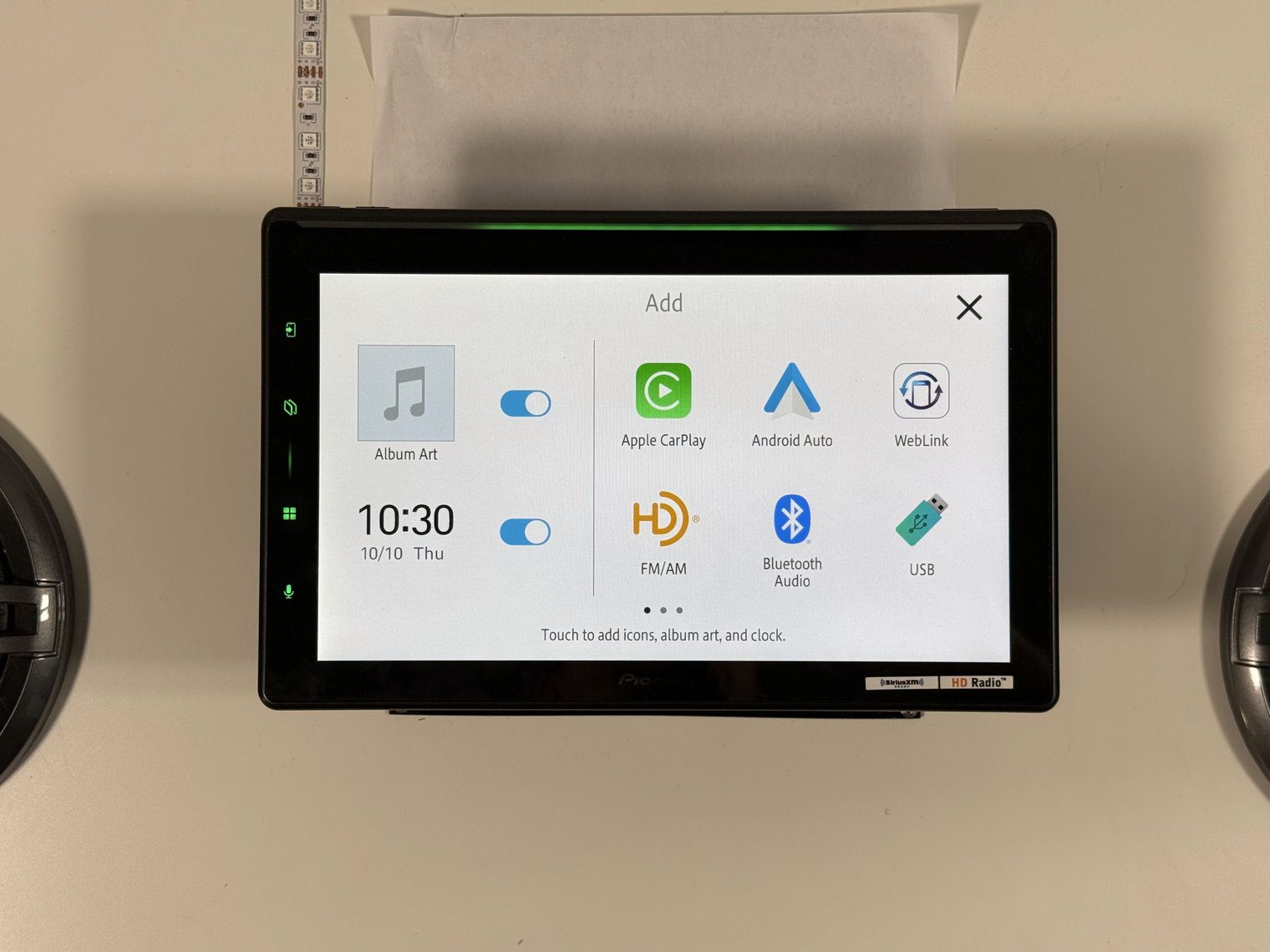 Pioneer DMH-WT8000NEX Add screen with album art and clock widget toggles and source icons